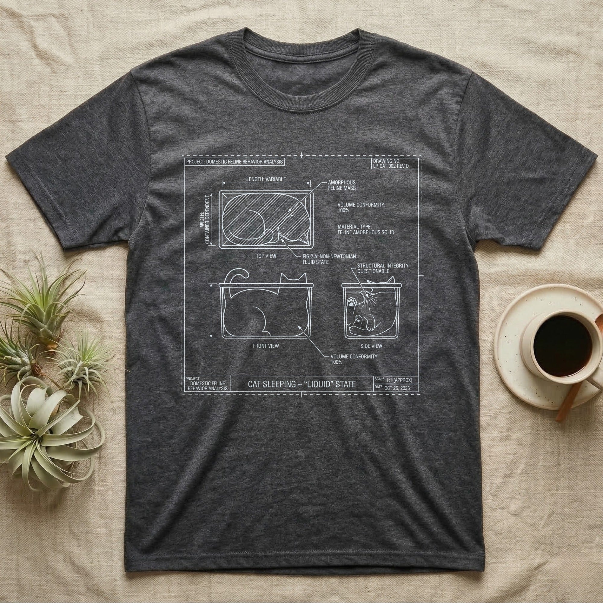 T-shirt with diagram of a sleeping cat labeled "Liquid" state.