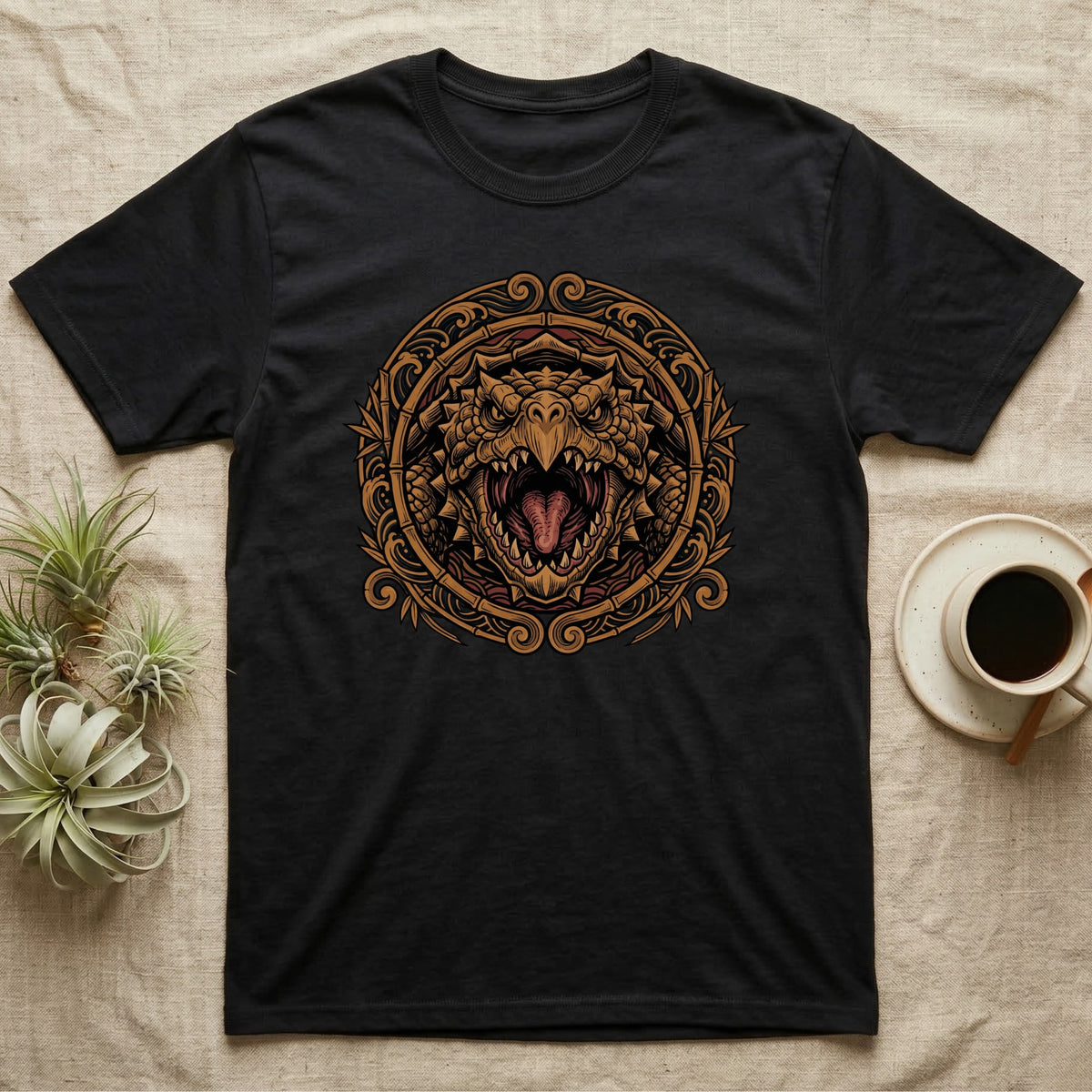 Black t-shirt with a detailed, ornate serpent's head graphic.