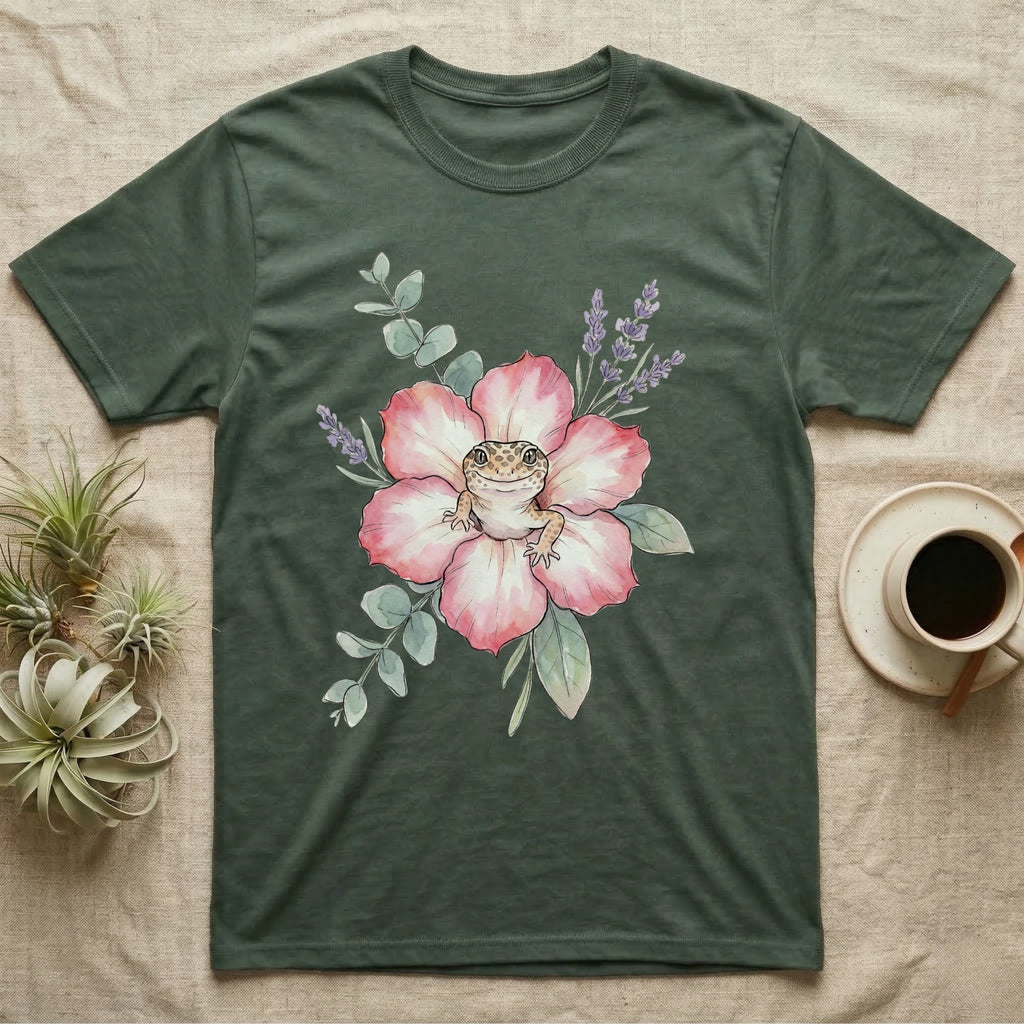 Green t-shirt with leopard gecko and flower graphic.
