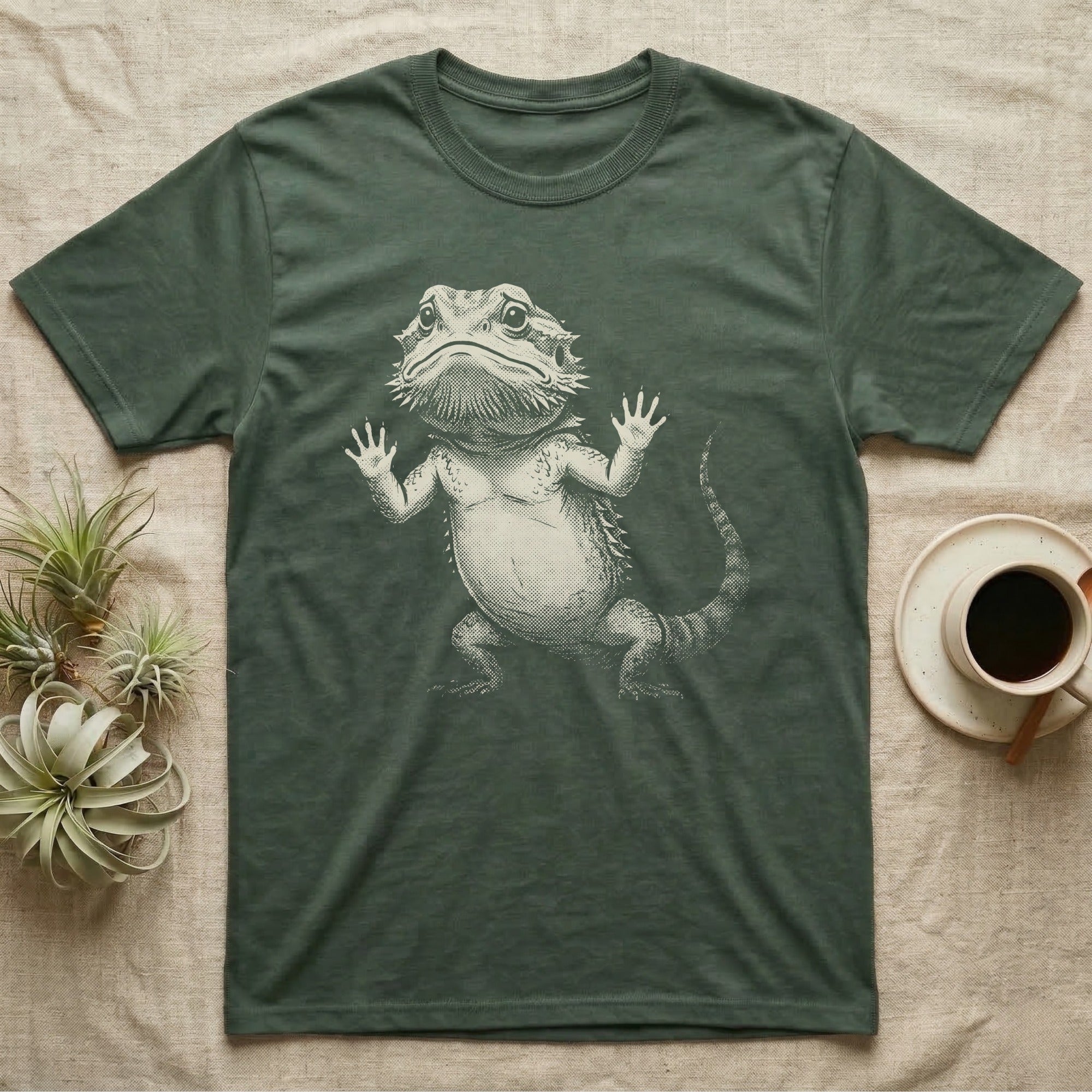 Begging Bearded Dragon T-Shirt in Military Green — Sad-meme halftone illustration of a bearded dragon standing upright with arms pressed to unseen glass, looking forlorn.