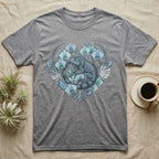 Grey t-shirt with heart-shaped floral iguana graphic.