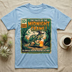 Tortoise Midnight Crawl Comic T-Shirt in Light Blue — Vintage comic cover of a witch-hatted tortoise with candy corn in a moonlit forest, "Tales of the Midnight Crawl."