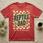Red t-shirt with "Reptile Dad" text, scales, and lizards, plus phrases.