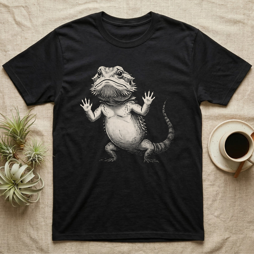 Begging Bearded Dragon T-Shirt in Black — Sad-meme halftone illustration of a bearded dragon standing upright with arms pressed to unseen glass, looking forlorn.