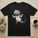 Begging Bearded Dragon T-Shirt in Black — Sad-meme halftone illustration of a bearded dragon standing upright with arms pressed to unseen glass, looking forlorn.