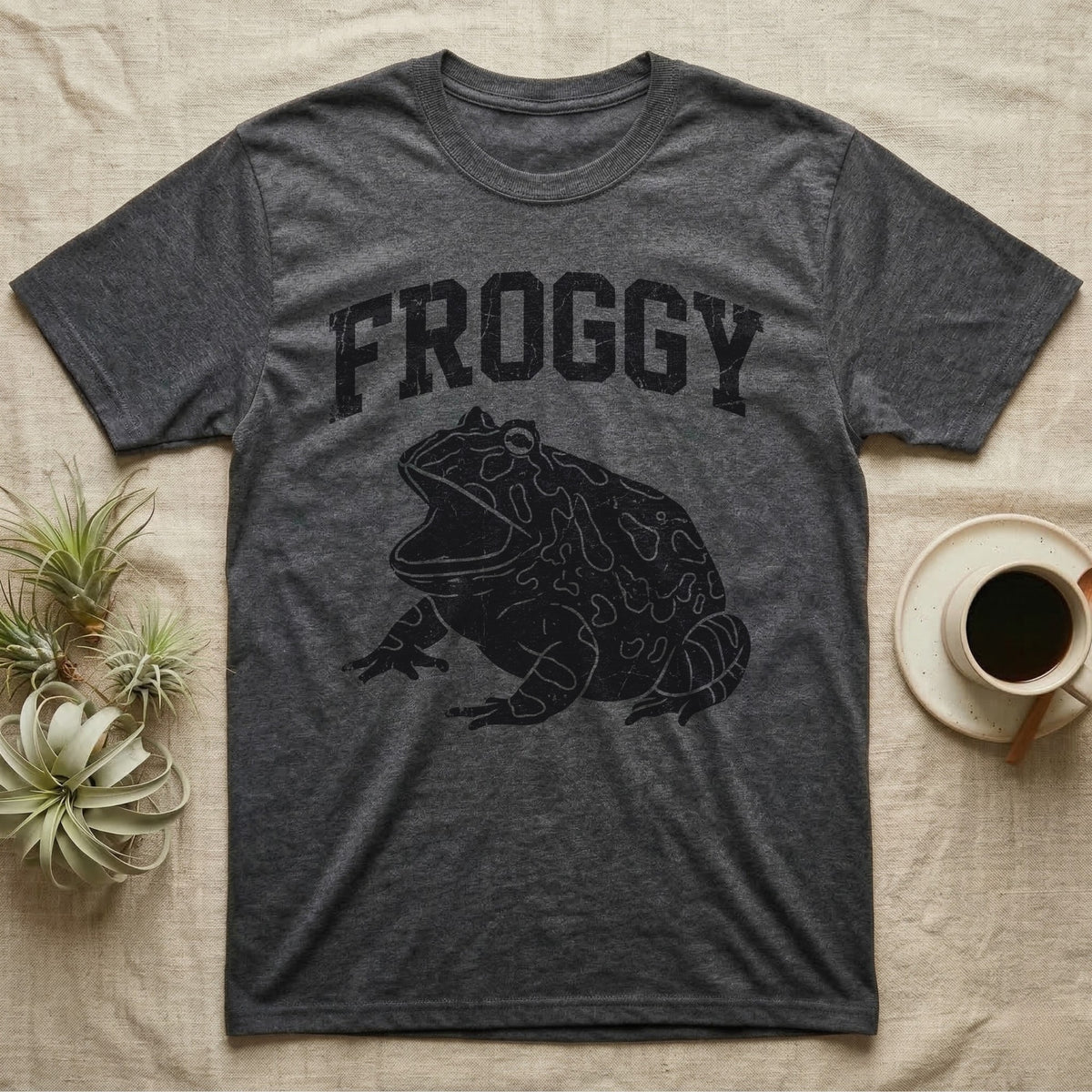 Pacman Frog Froggy T-Shirt in Dark Heather — Worn one-ink print of a round pacman frog puffed up with its mouth gaped wide, under the arched word FROGGY