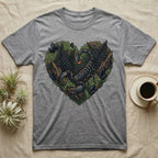 Grey t-shirt with a heart-shaped graphic of a scorpion and foliage.