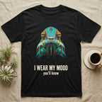 Flat-black mug-shot portrait of a turquoise and rust panther chameleon staring at the camera, with the printed words I Wear My Mood, you'll know. — shown on a Black tee.