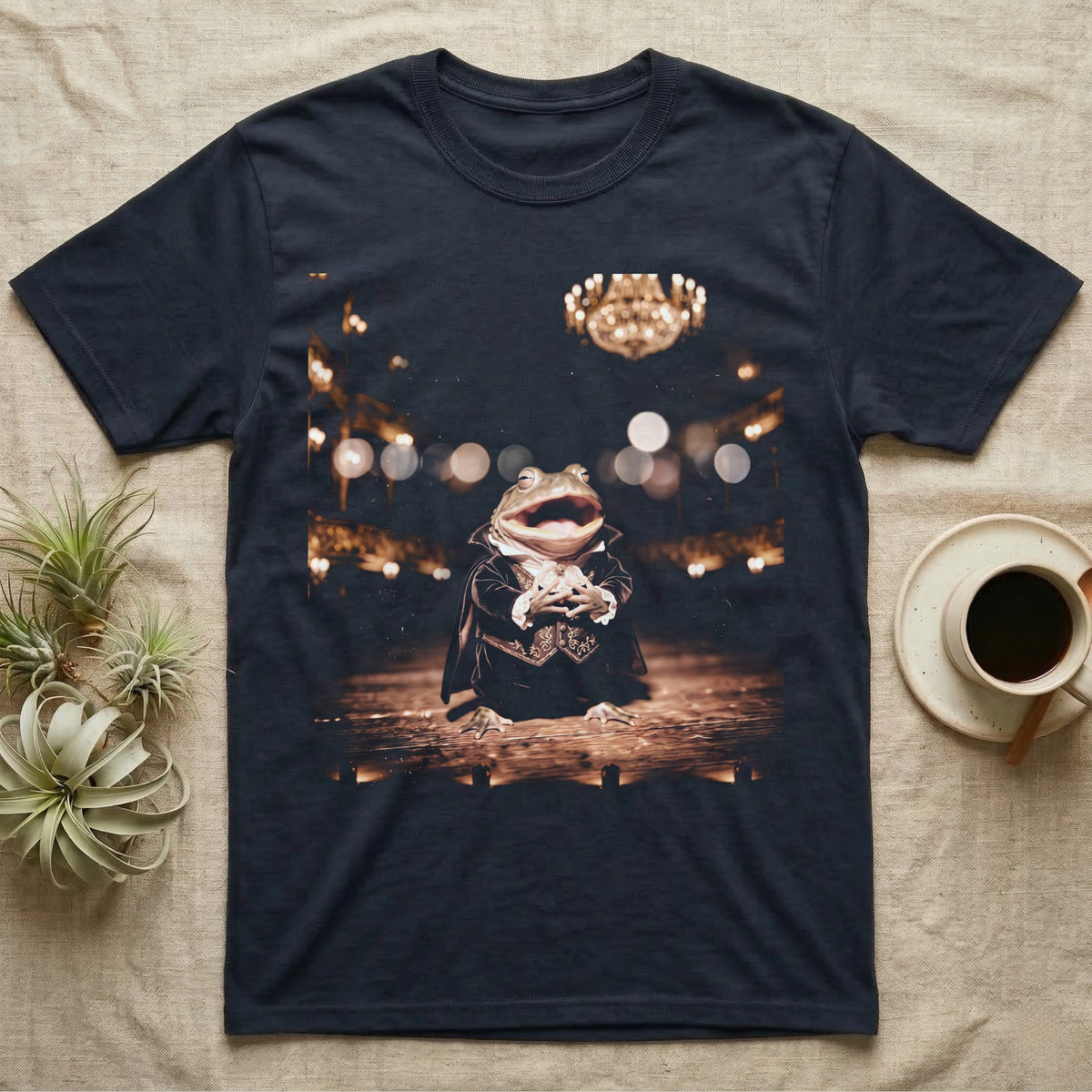 Budgett's Frog Opera Singer T-Shirt in Navy — Budgett's frog in a velvet tailcoat and lace collar singing under a warm opera house chandelier.