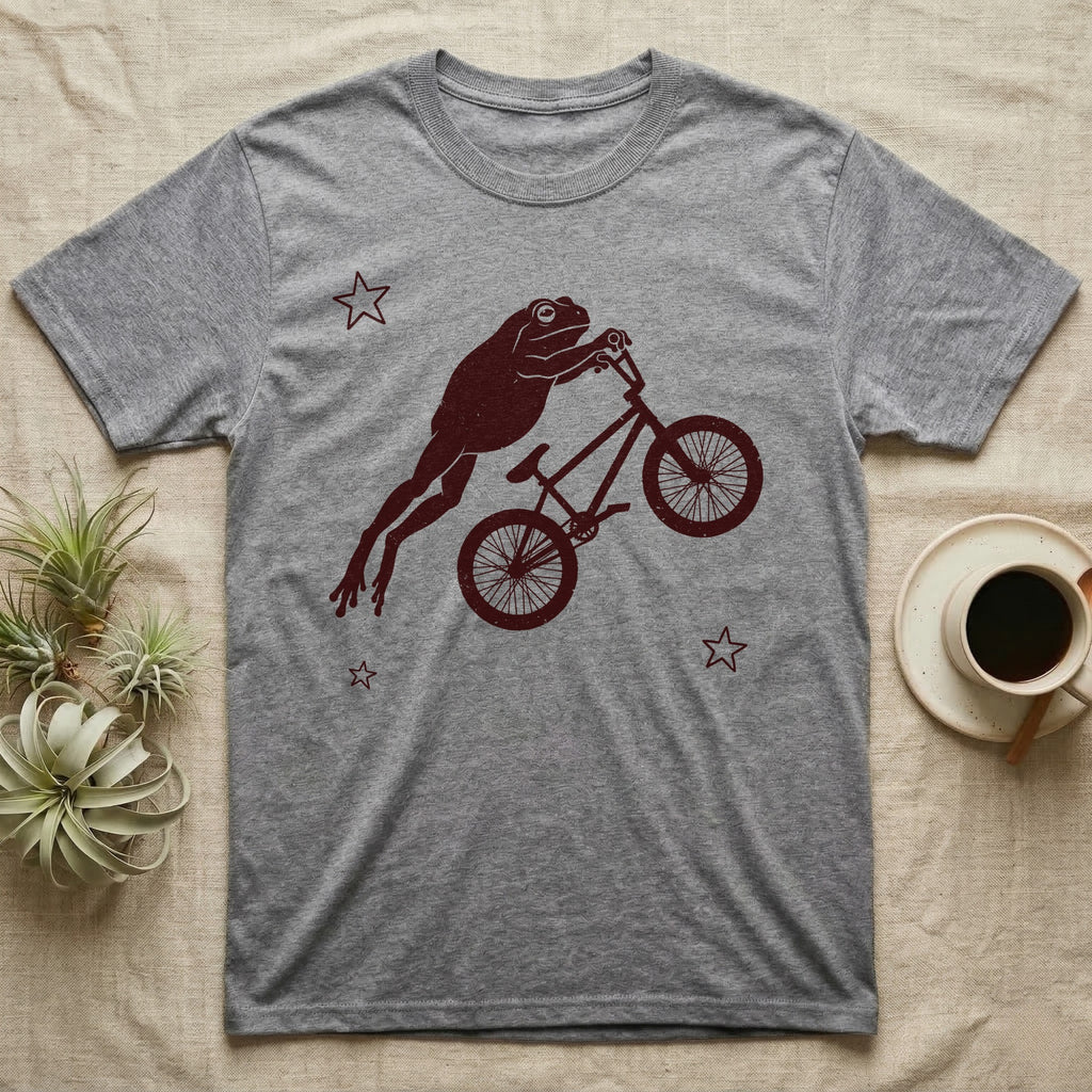 Tree Frog BMX T-Shirt in Sport Grey — One-ink worn screen print of a White's tree frog riding a BMX bike mid-air, body stretched straight out behind the handlebars.