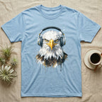 Light blue t-shirt with a watercolor eagle wearing headphones.