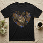 Black t-shirt with a heart-shaped design of a chinchilla, plants, and stones.