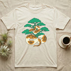 Ball python wrapped around a stylized tree on a cream t-shirt.