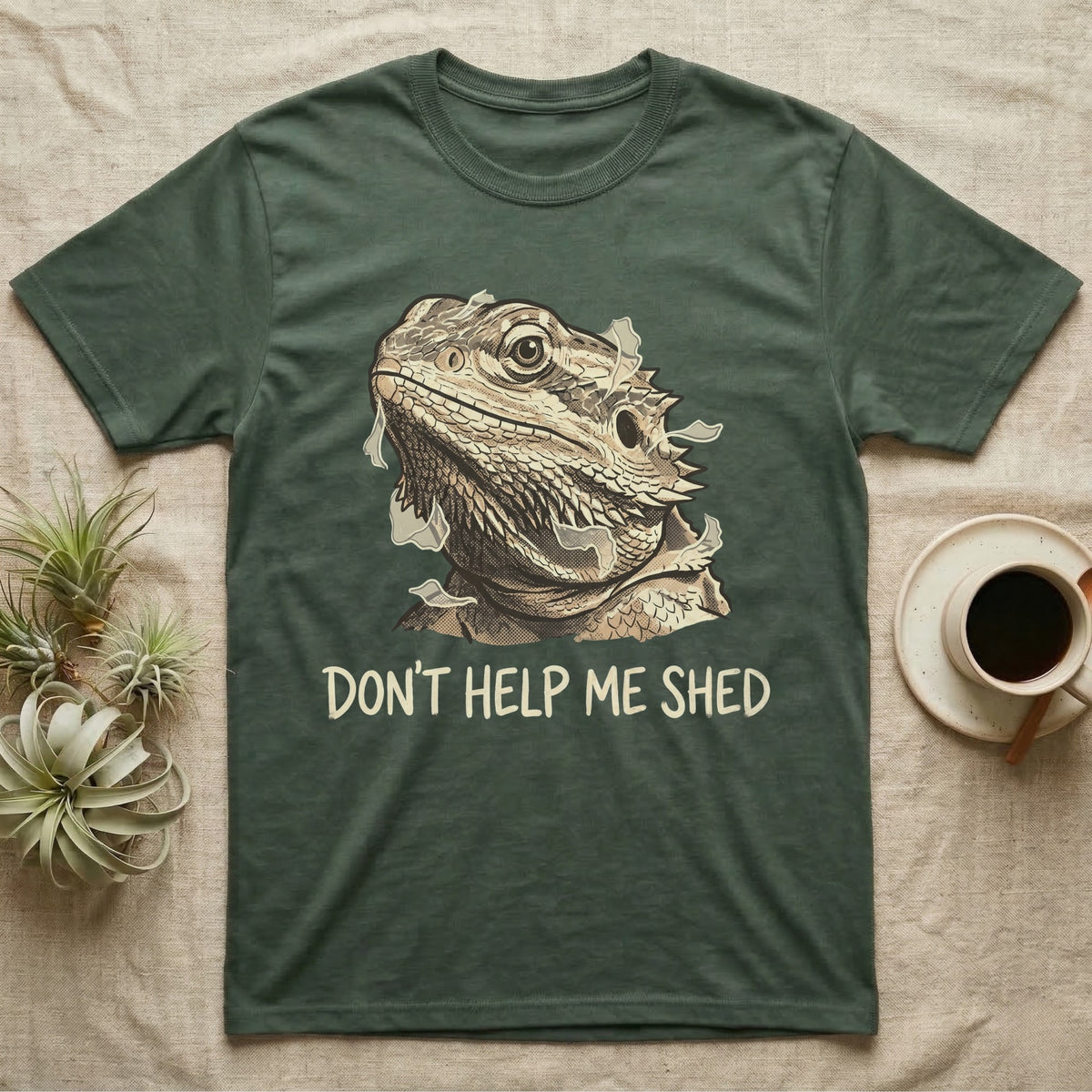 Don't Help Me Shed T-Shirt in Military Green — Retro-illustration of a bearded dragon mid-shed with a deadpan side-eye and a marker caption reading Don't Help Me Shed.