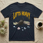 Rhino Beetle Feral T-Shirt in Navy — Horned rhinoceros beetle standing head-on below a dripping amber-gold metal "Lifts Heavy" wordmark