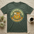 Bearded Dragon Boo-Basking T-Shirt in Military Green — Retro badge of a caped bearded dragon on a green-glowing pumpkin, "Boo-Basking Division, Spooky But Still Cozy."