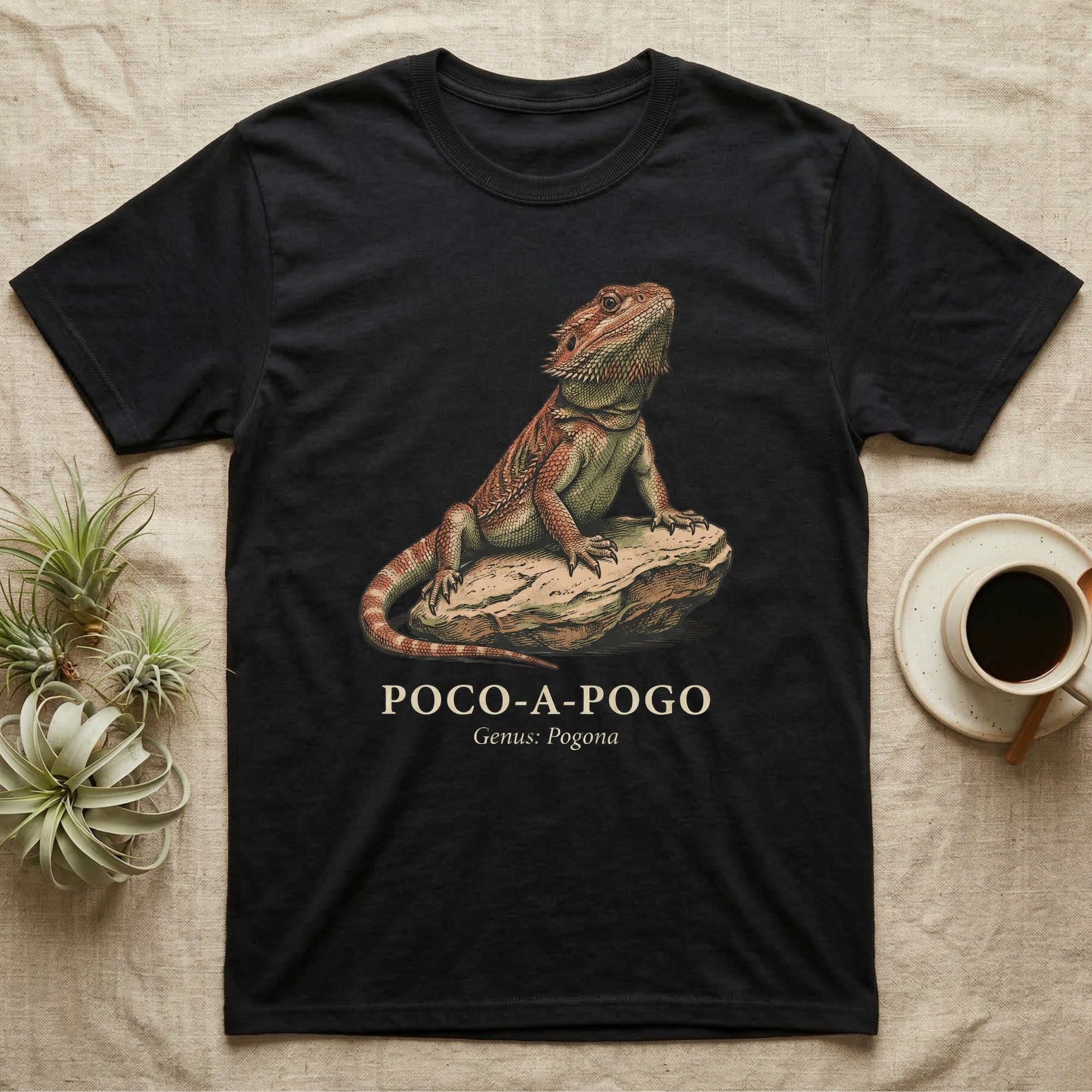 Black t-shirt featuring a detailed illustration of a bearded dragon on a rock.