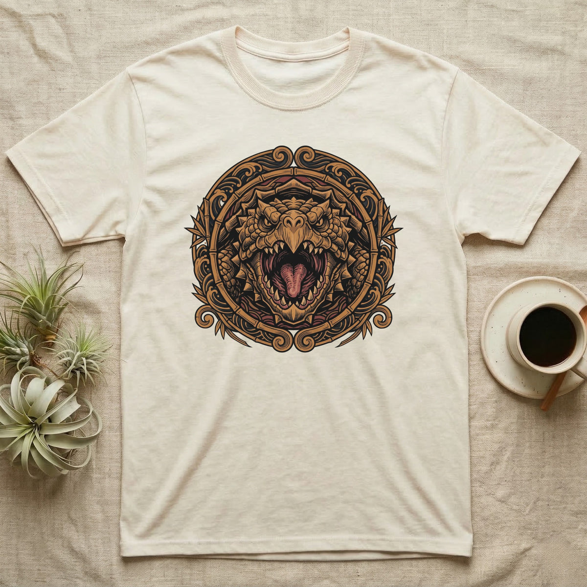 Cream t-shirt with intricate dragon head emblem.