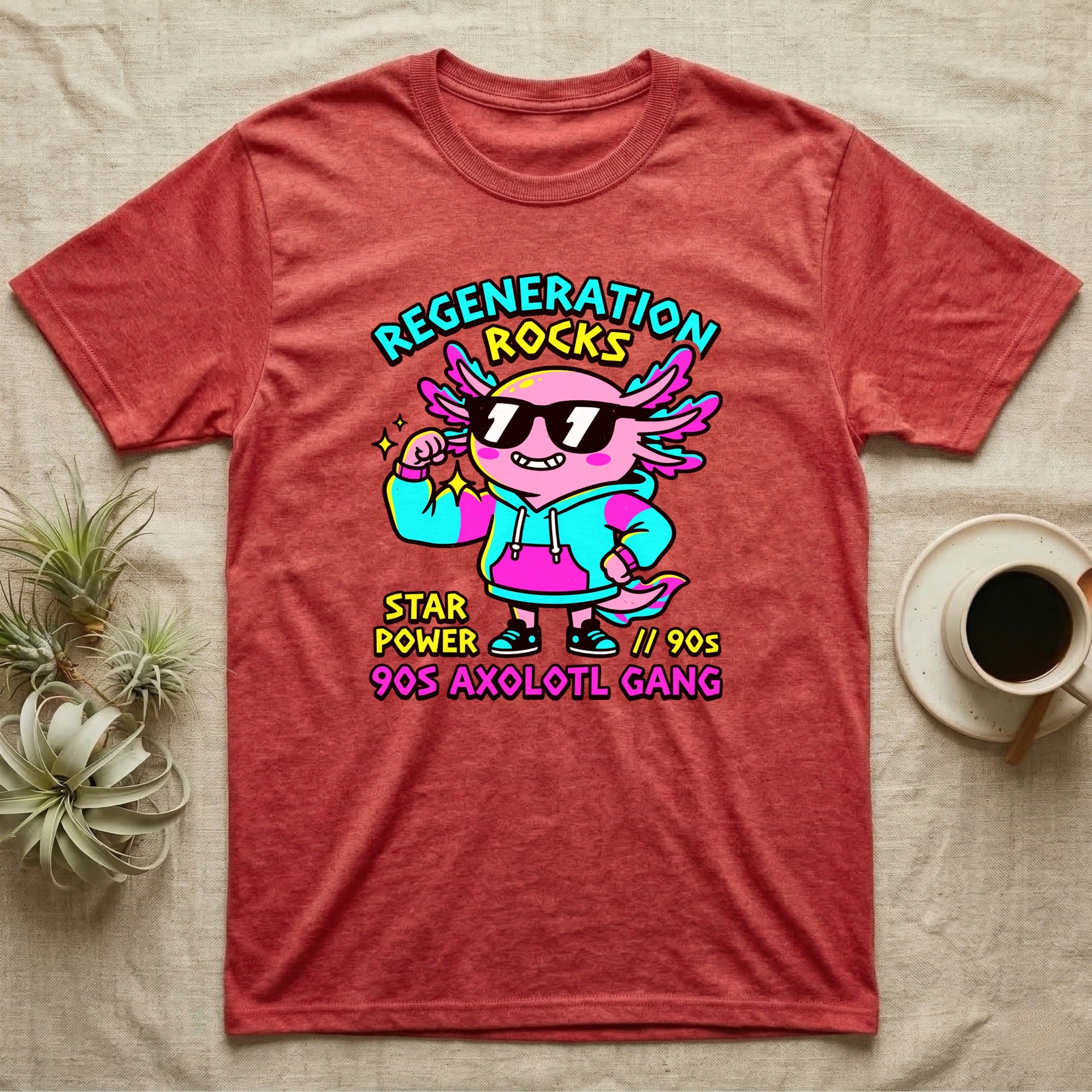 Axolotl Regeneration Rocks T-Shirt in Heather Red — Neon 90s cartoon pink axolotl in shades flexing under "Regeneration Rocks" lettering.