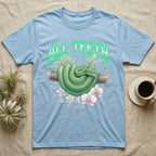 Emerald Tree Boa Feral T-Shirt in Light Blue — Coiled emerald tree boa on a branch below a dripping emerald-green metal "All Teeth" wordmark