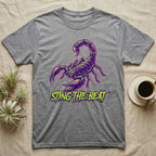 Gray t-shirt with a purple and green scorpion graphic and "STING THE BEAT" text.