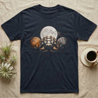 Isopod Moon Trio T-Shirt in Navy — Three isopod morphs in a shallow arc before a full moon, lit warm and low, fading into black.