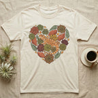 Cream t-shirt with a heart-shaped succulent and lizard design.