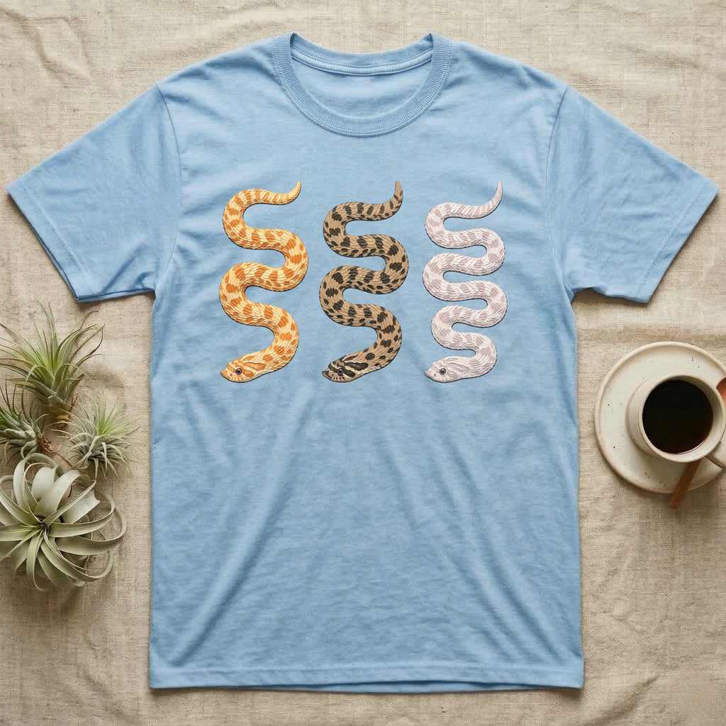 Hognose Morph Triptych T-Shirt in Light Blue — Palette-knife painting of three western hognose snakes side by side, albino, anaconda and snow morphs.