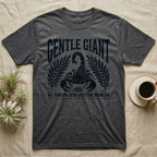Emperor Scorpion Gentle Giant T-Shirt in Dark Heather — Folk woodblock crest of an emperor scorpion under an arched GENTLE GIANT headline, flanked by palm fronds.