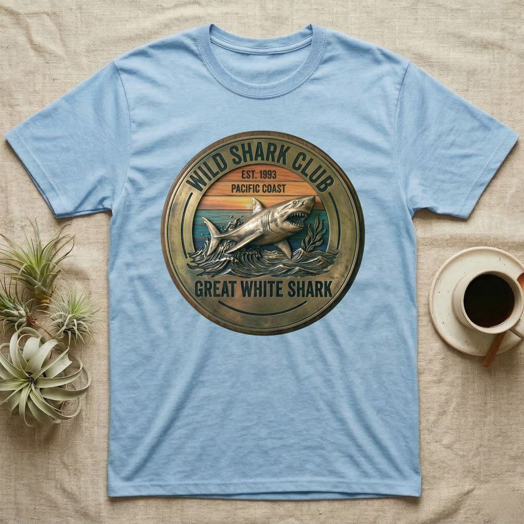 Pale blue t-shirt with a circular "Wild Shark Club Great White Shark" emblem.