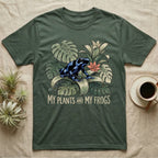 Plants And Frogs T-Shirt in Military Green — Naturalist-plate illustration of a dart frog perched in lush foliage with hand-lettered text reading My Plants And My Frogs.