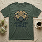Dark green t-shirt with a bearded dragon graphic and "JUDGING YOUR CHOICES" text.