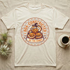 Ball Python Boa-Constricted Candy T-Shirt in Natural — Distressed badge of a witch-hatted ball python on three jack-o'-lanterns, "Boa-Constricted by the Candy."