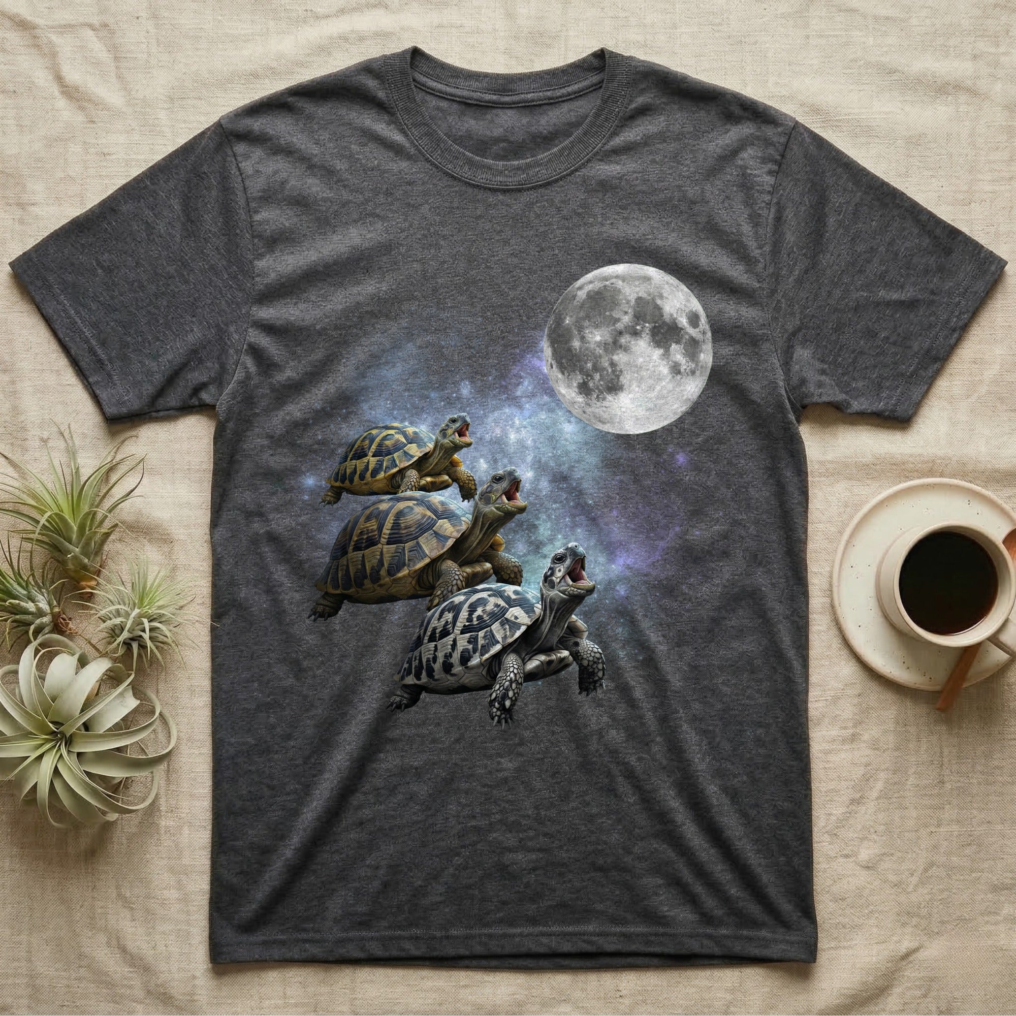 Hermann's Tortoise Moon Howl T-Shirt in Dark Heather — Three Hermann's Tortoise colour morphs howling at a full moon over a nebula on a dark grey t-shirt.