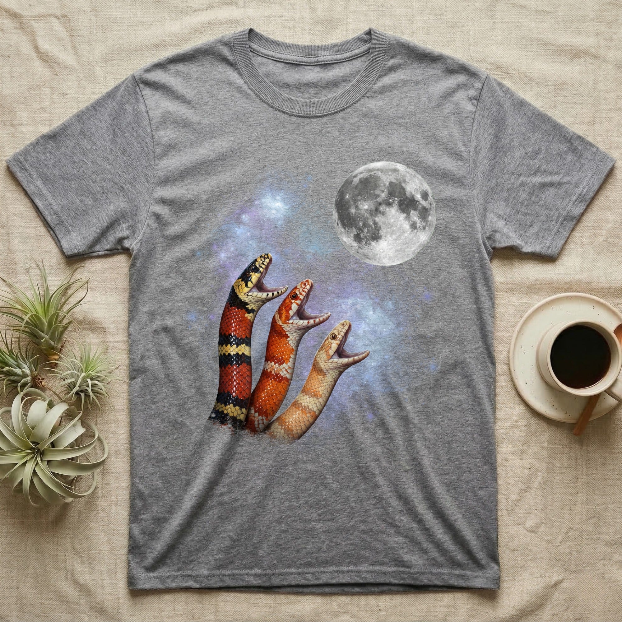 Milk Snake Moon Howl T-Shirt in Sport Grey — Three Milk Snake colour morphs howling at a full moon over a nebula on a dark grey t-shirt.