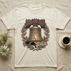 Leopard Gecko Liberty Bell T-Shirt in Natural — Engraved leopard gecko emerging beneath the bronze Liberty Bell inside an oak-leaf and acorn wreath.