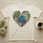 Cream t-shirt with a blue poison dart frog in a heart-shaped botanical design.