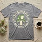 Grey t-shirt with "DUMPY TREE FROG ANTI-HUSTLE CLUB" text and a frog on a mushroom.