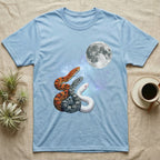 Corn Snake Moon Howl T-Shirt in Light Blue — Three Corn Snake colour morphs howling at a full moon over a nebula on a dark grey t-shirt.