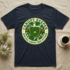 Dark t-shirt with round "Canopy Keeper" design featuring a green tree python.