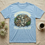 Dairy Cow Isopod Substrate Specialists T-Shirt in Light Blue — Vintage print of a dairy cow isopod colony on a mossy soil clod between "Substrate Specialists" banners.