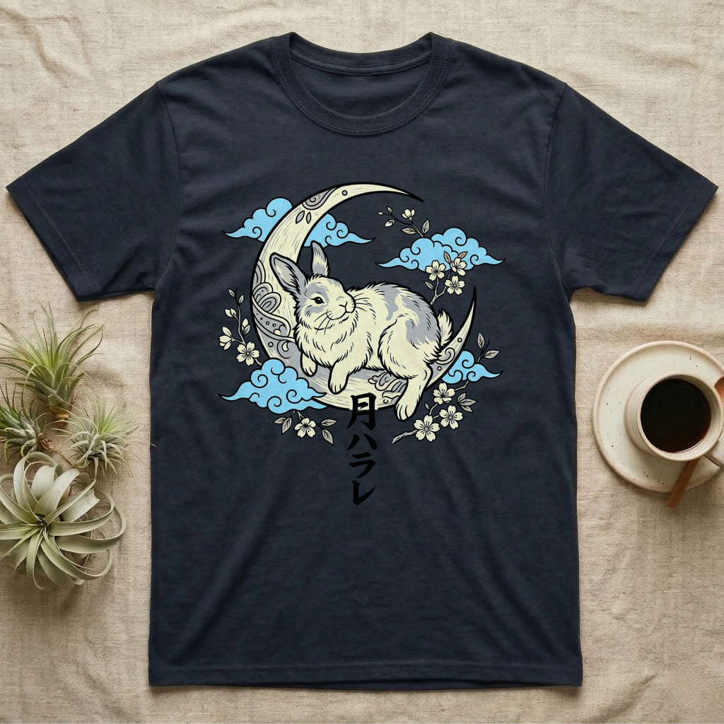 Dark t-shirt featuring a white and grey rabbit on a crescent moon with clouds and cherry blossoms.