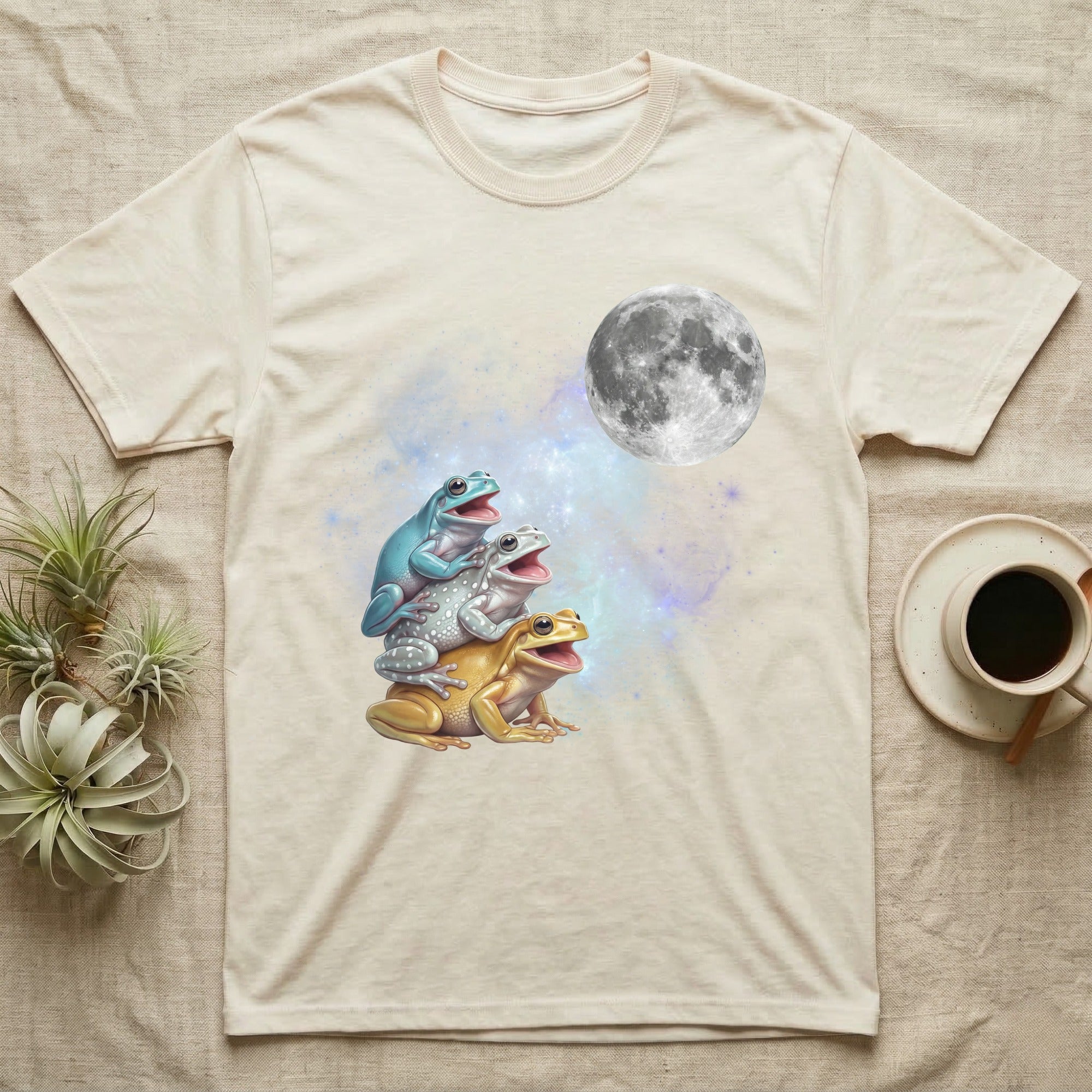 White's Tree Frog Moon Howl T-Shirt in Natural — Three White's Tree Frog colour morphs howling at a full moon over a nebula on a dark grey t-shirt.