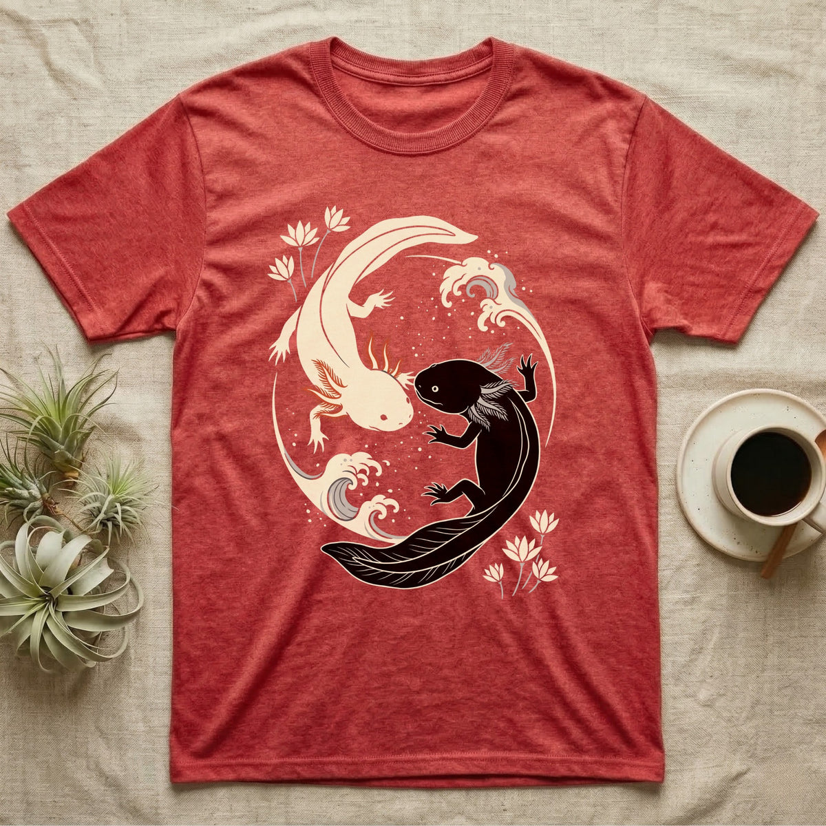 Axolotl Yin-Yang T-Shirt in Heather Red — Japanese woodblock style print of a cream axolotl with red gills and a black axolotl curled nose to nose into a circle with waves and water lilies