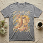 Grey t-shirt with cowboy boots, a gecko, and floral accents.