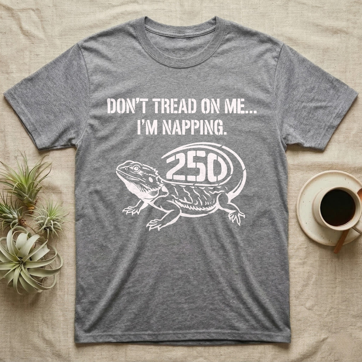 Bearded Dragon Napping T-Shirt in Sport Grey — White stencil bearded dragon resting with 250 cut into the tail under text Don't Tread On Me, I'm Napping.