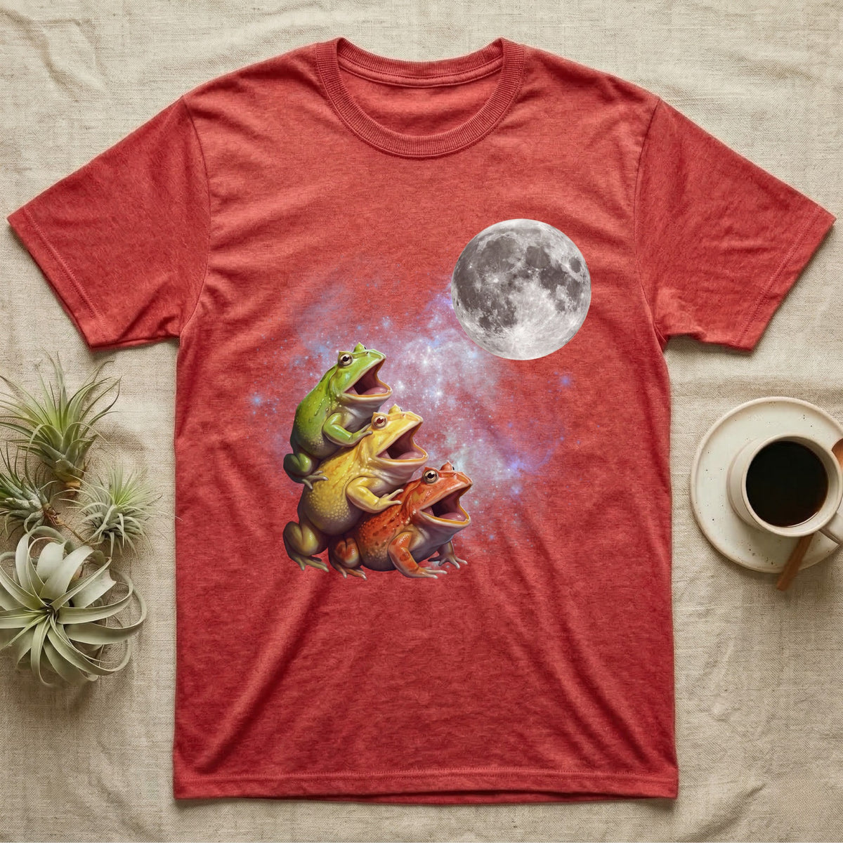 Pacman Frog Moon Howl T-Shirt in Heather Red — Three Pacman Frog colour morphs howling at a full moon over a nebula on a dark grey t-shirt.
