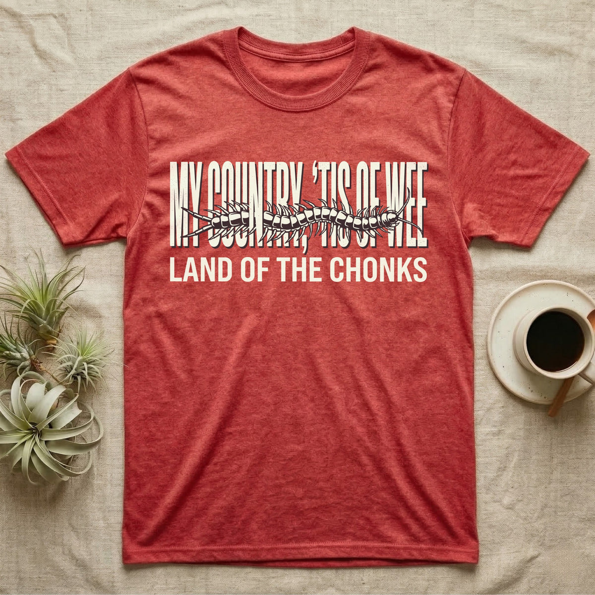 Centipede Land Of Chonks T-Shirt in Heather Red — Black-and-white woodcut centipede across distressed text reading My Country Tis of Wee, Land of the Chonks.