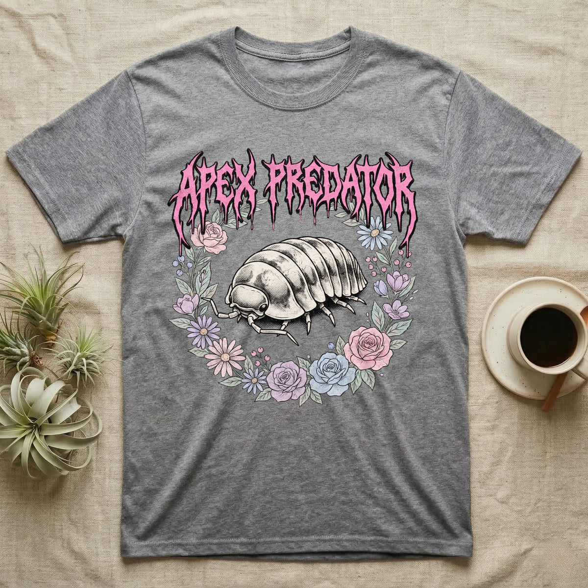 Apex Predator Isopod T-Shirt in Sport Grey — Bootleg design of a cute isopod in a floral wreath under dripping death-metal lettering reading "Apex Predator."