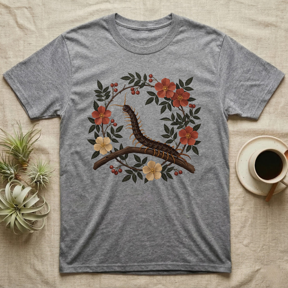 Vietnamese Centipede Botanical T-Shirt in Sport Grey — Vietnamese giant centipede painted in matte oil, in profile on a branch inside an oval bower of flowering bramble.